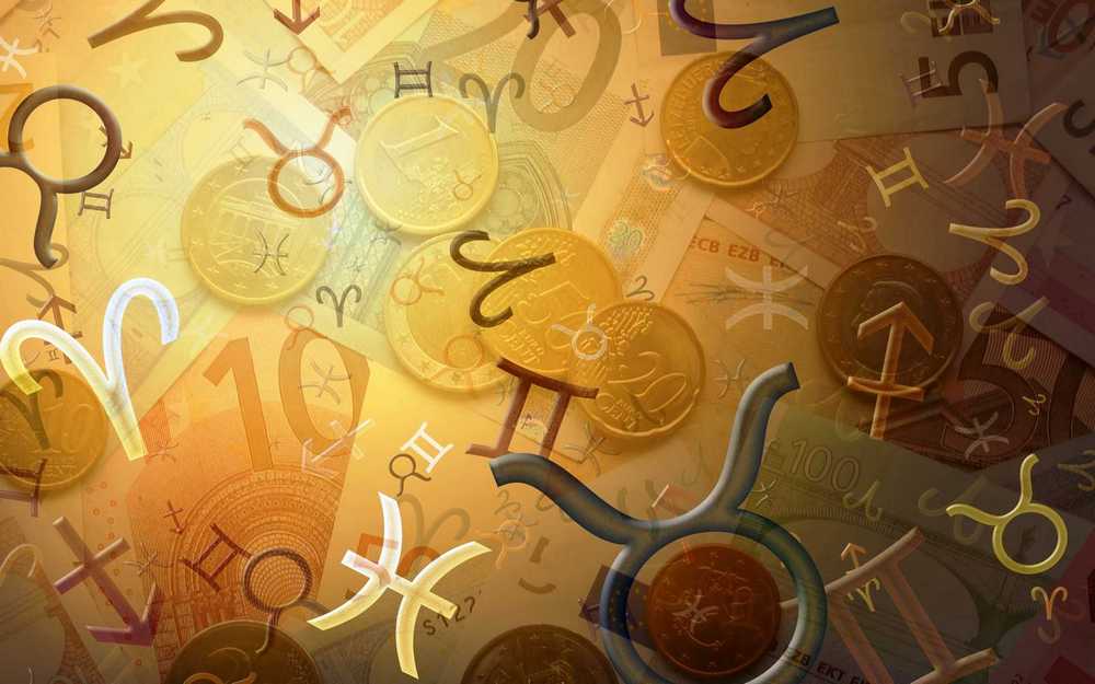 Символы знаков зодиака на денежных купюрах