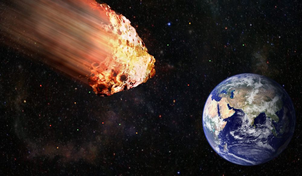 Астероид в космосе возле Земли